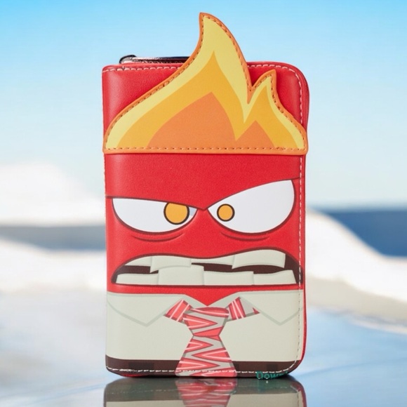 Loungefly Handbags - LOUNGEFLY Inside Out GLOWS IN DARK  Anger Cosplay Glow Zip Around Wallet